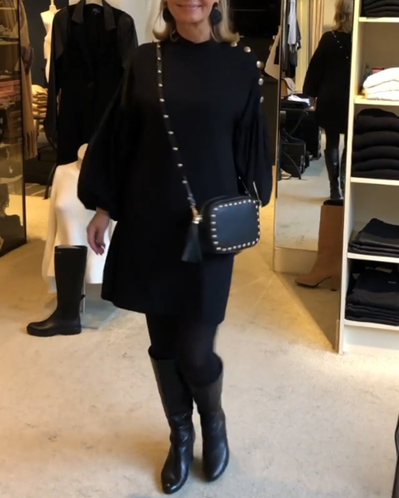 Classic black dress with lantern sleeves