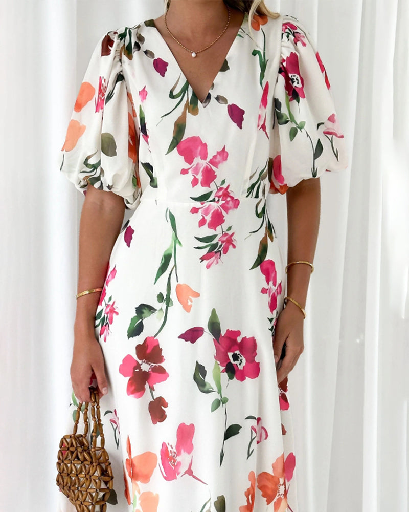 Elegant dress with puff sleeves and floral print