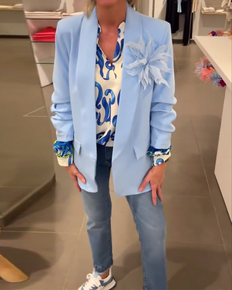 Elegant long-sleeved top with printed V-neck