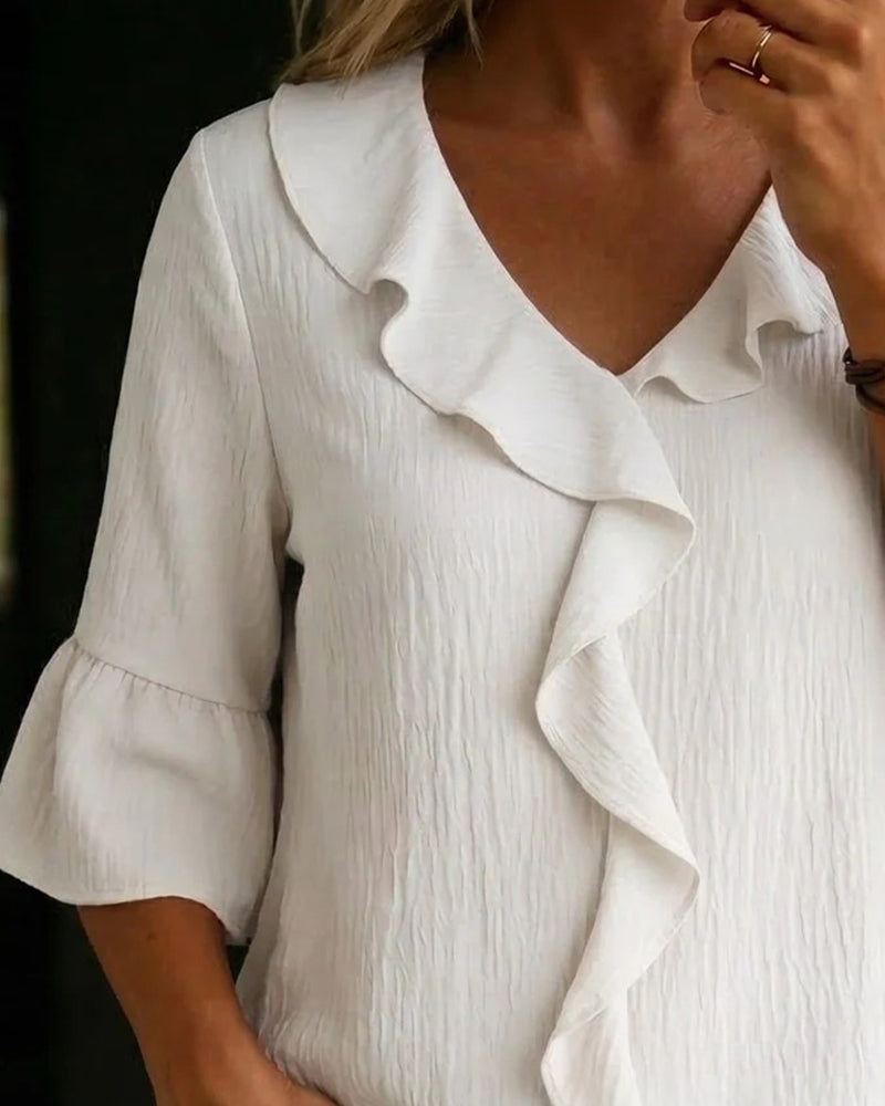 Textured Ruffled Bell Sleeve Blouse