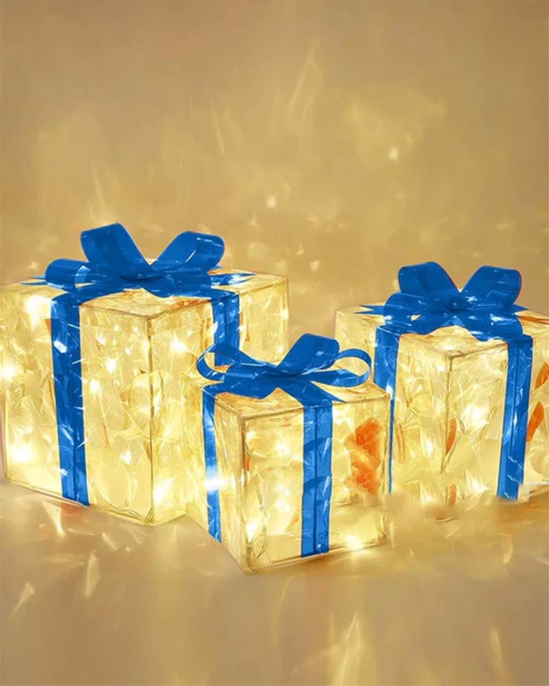 Christmas Decorations In The Form Of Glowing Gift Boxes
