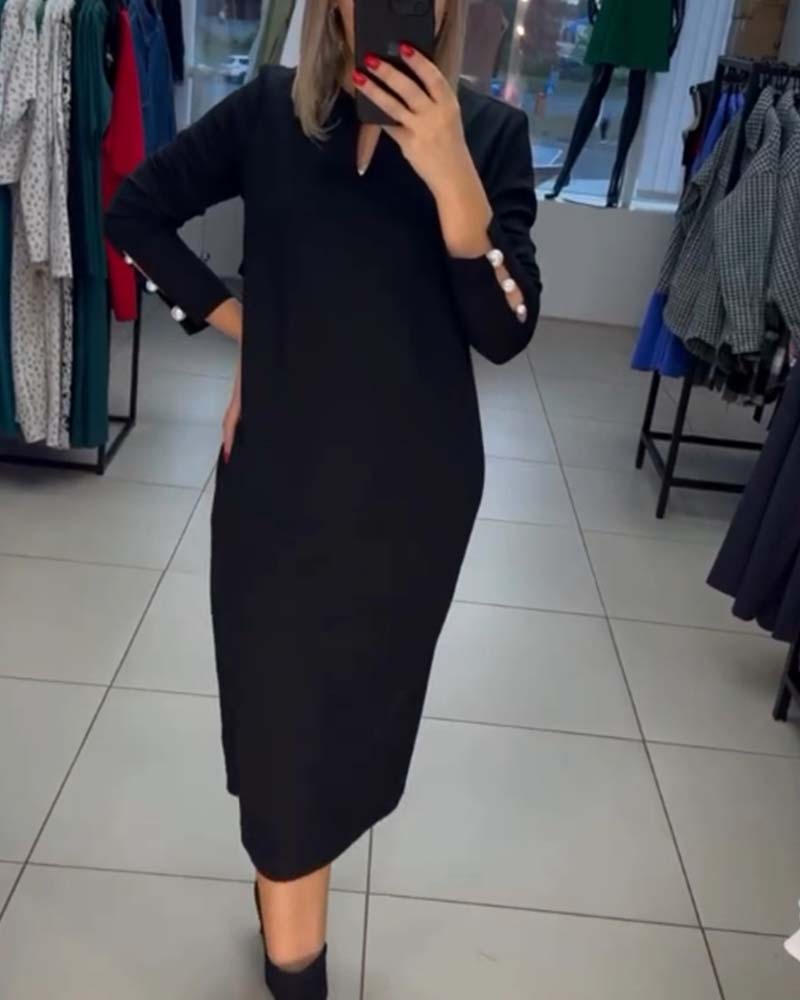 Elegant dress with pearl buttons