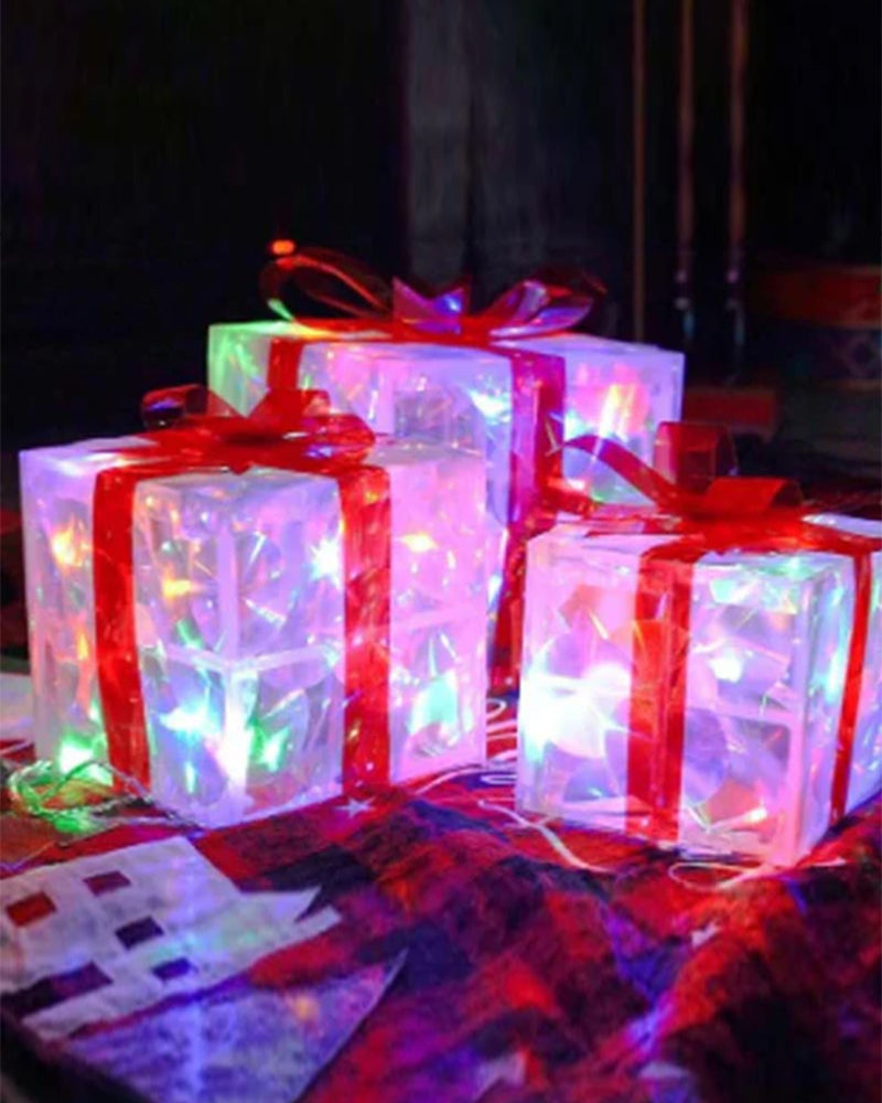 Christmas Decorations In The Form Of Glowing Gift Boxes