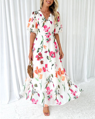 Elegant dress with puff sleeves and floral print