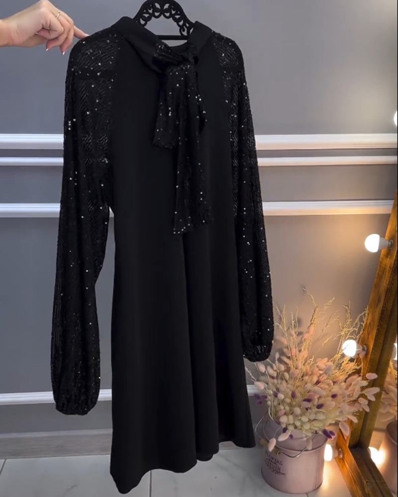 Solid color dress with patchwork sleeves