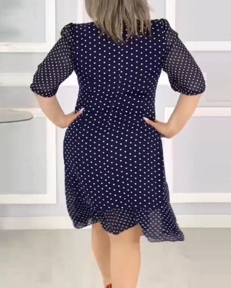 Elegant half-sleeve dress with polka dot print