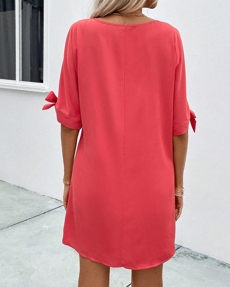 Twist round neck solid color dress