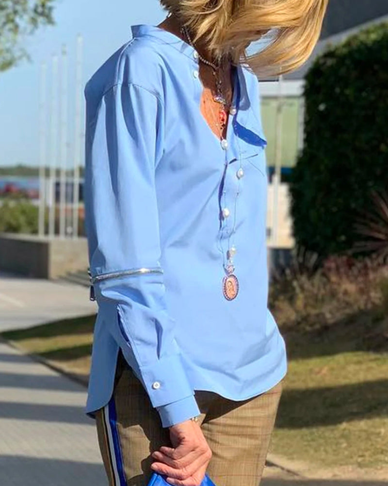 Buttoned solid color irregular top