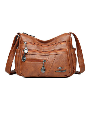 Multi-pocket soft leather crossbody bag